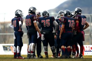 American Football Spieler, die alle Football Spielregeln kennen
